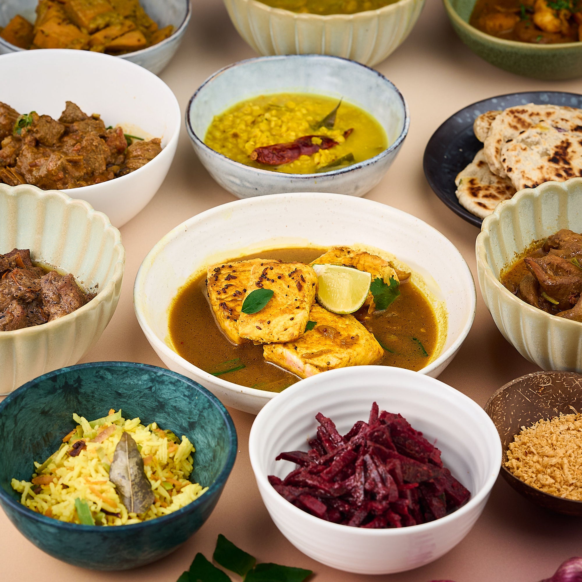 assortment of sri lankan curries in bowls