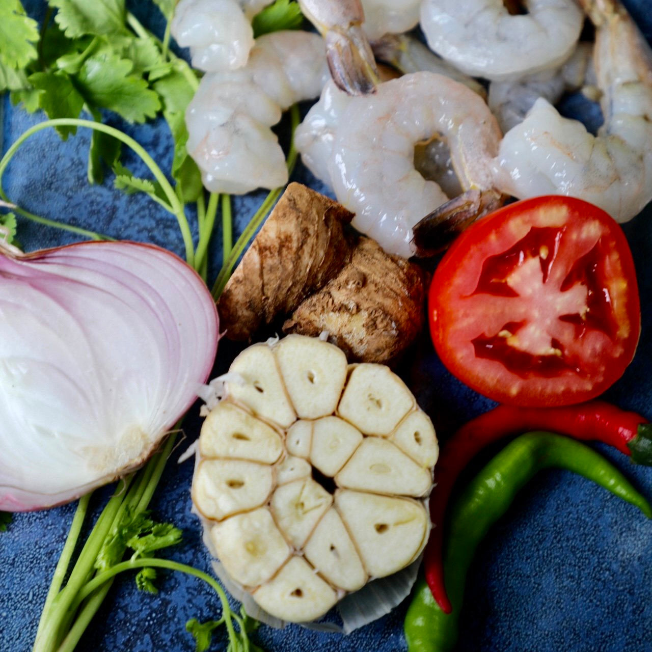 Creamy prawn curry served with white rice, garnished with curry leaves and chilli. Authentic Sri Lankan comfort food that’s easy to make and full of big, bold flavour.