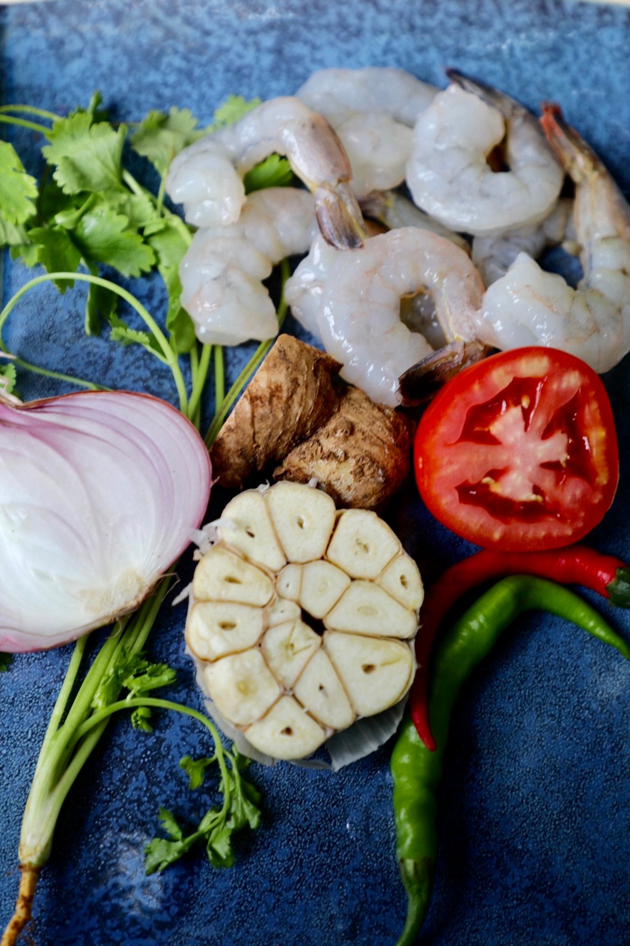 Creamy prawn curry served with white rice, garnished with curry leaves and chilli. Authentic Sri Lankan comfort food that’s easy to make and full of big, bold flavour.
